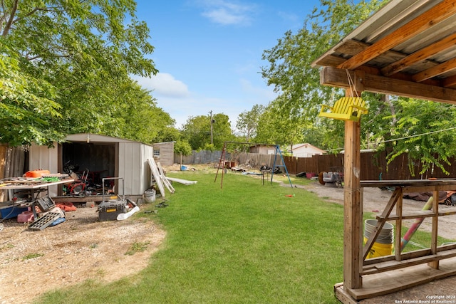 view of yard with a storage unit