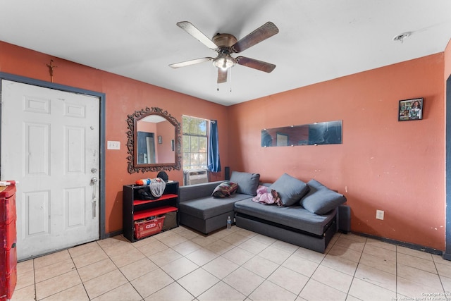 tiled living room with ceiling fan