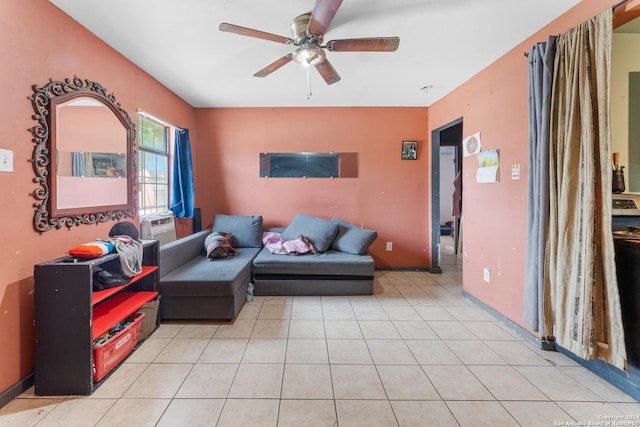 tiled living room featuring ceiling fan