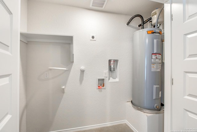 utility room with water heater