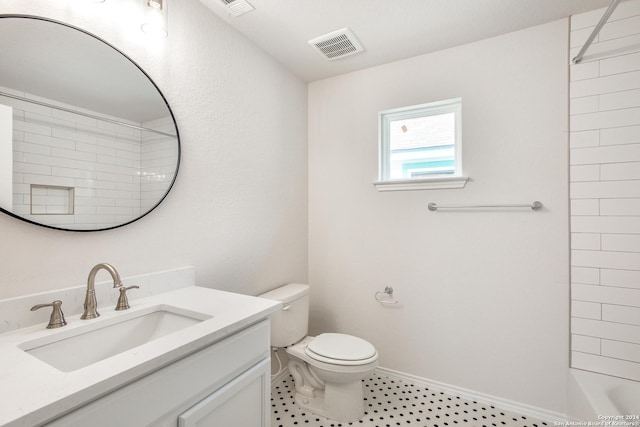 full bathroom featuring toilet, shower / bath combination, and vanity