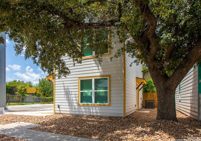 view of property exterior with central AC unit