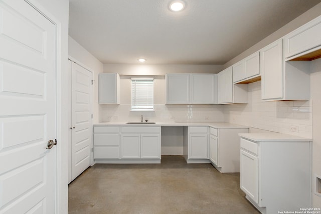 kitchen with white cabinets and sink