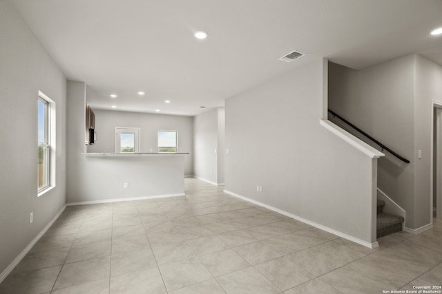 interior space featuring light tile patterned flooring