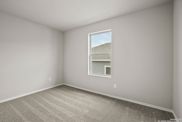 unfurnished room featuring carpet floors