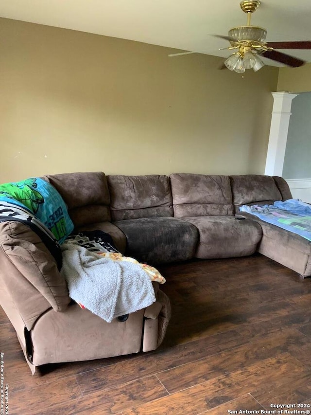 living room with hardwood / wood-style flooring and ceiling fan