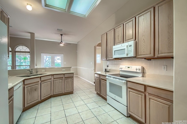 kitchen with ceiling fan, decorative backsplash, white appliances, light tile patterned flooring, and sink