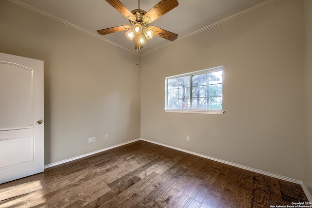 empty room featuring ceiling fan, crown molding, and hardwood / wood-style flooring