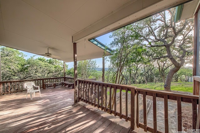 wooden terrace with ceiling fan