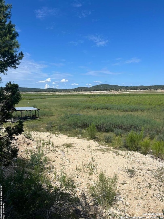 view of mountain feature with a rural view