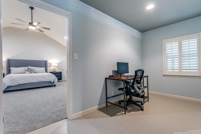 home office with ceiling fan and vaulted ceiling