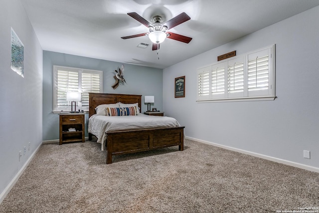 bedroom featuring ceiling fan and carpet flooring