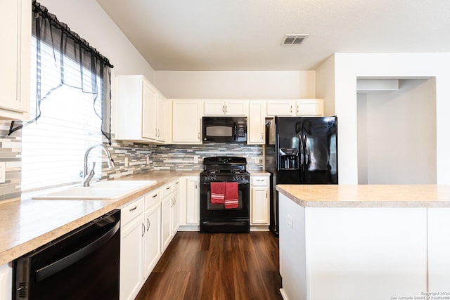 kitchen featuring white cabinets, black appliances, sink, backsplash, and dark hardwood / wood-style floors