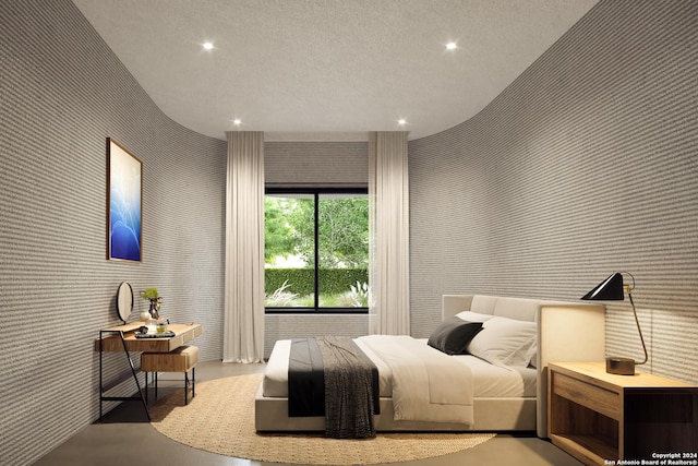 bedroom featuring concrete flooring, recessed lighting, and wallpapered walls