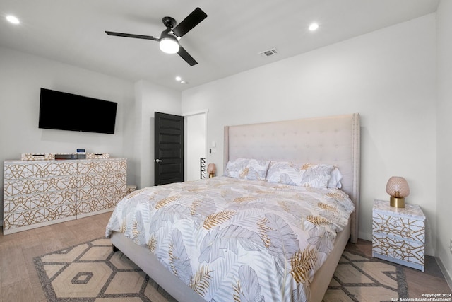 bedroom featuring wood-type flooring and ceiling fan