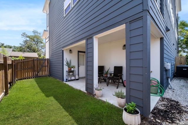 exterior space featuring cooling unit and a patio area