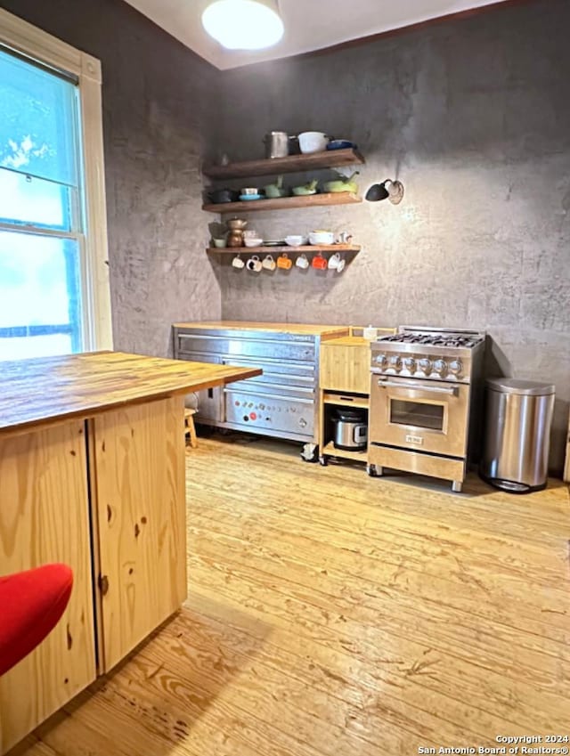 218 Coleman, San Antonio, TX 78208 - bar area with high end stove and wood finished floors