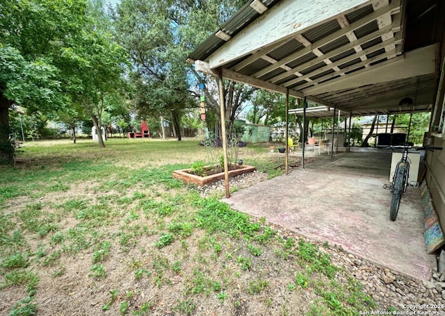 218 Coleman, San Antonio, TX 78208 - view of grassy yard featuring a patio