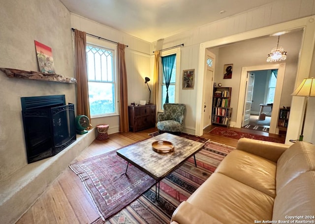 218 Coleman, San Antonio, TX 78208 - living area with hardwood / wood-style flooring and a fireplace with raised hearth