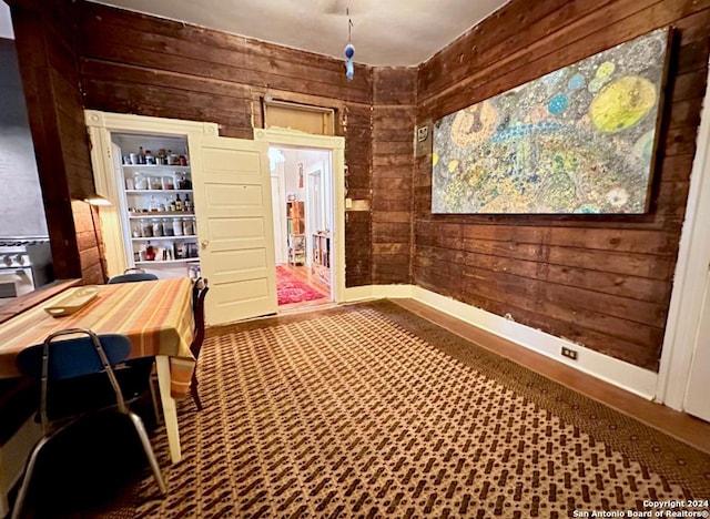 218 Coleman, San Antonio, TX 78208 - unfurnished dining area featuring wooden walls
