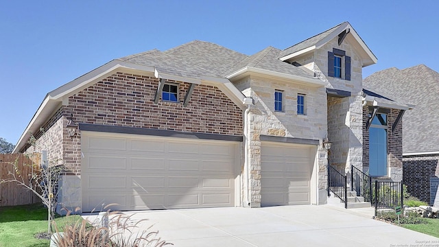 view of front of property featuring a garage