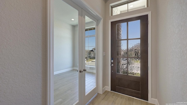 doorway to outside featuring french doors