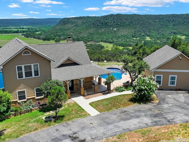 view of front facade featuring a mountain view