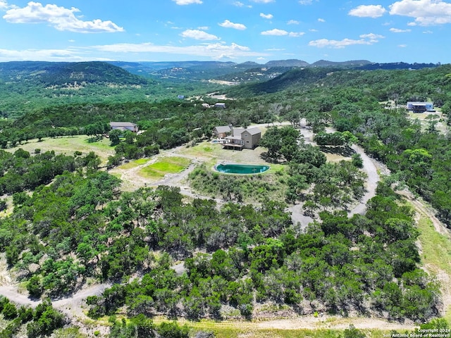 bird's eye view with a mountain view