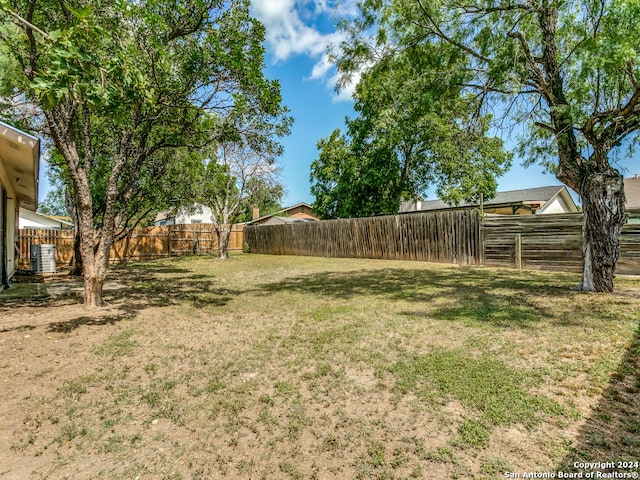 view of yard featuring central AC