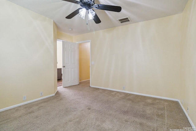 unfurnished room with light carpet and ceiling fan