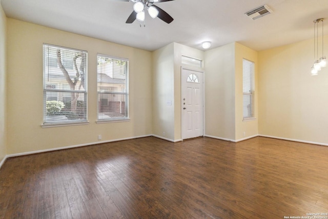 foyer entrance featuring ceiling fan and dark hardwood / wood-style flooring