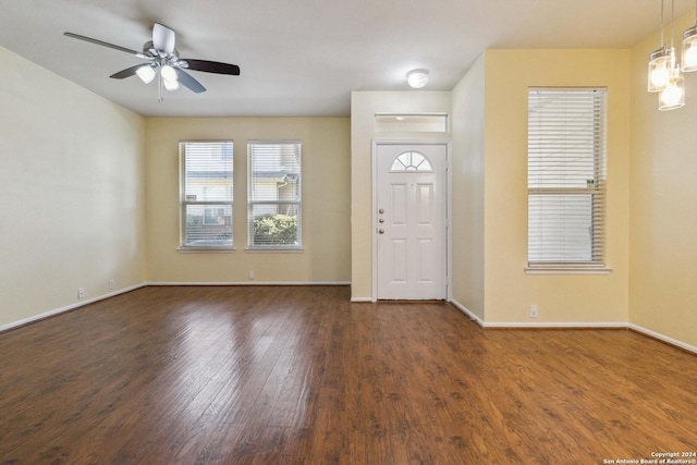 entrance foyer featuring dark wood-type flooring and ceiling fan