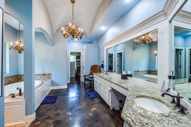 full bath with a walk in closet, a garden tub, a notable chandelier, and a sink