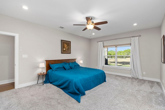 bedroom featuring recessed lighting, visible vents, carpet flooring, ceiling fan, and baseboards