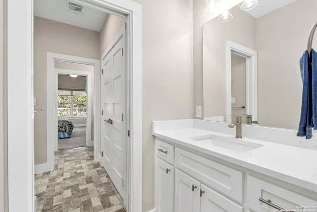 bathroom featuring visible vents and vanity