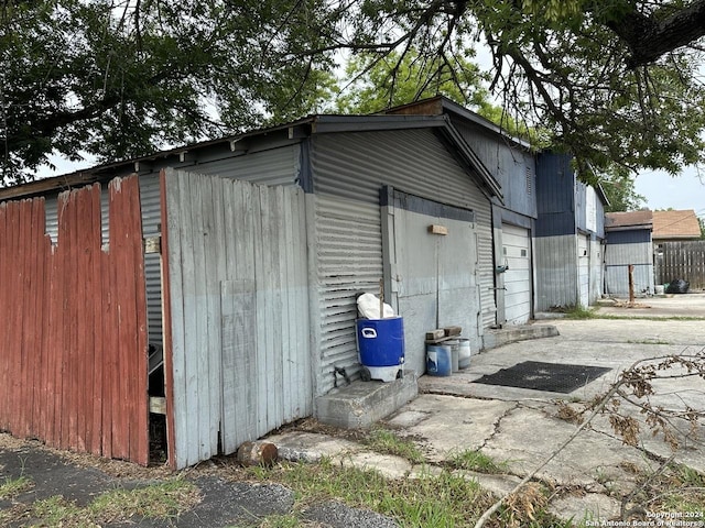 view of outbuilding with a garage