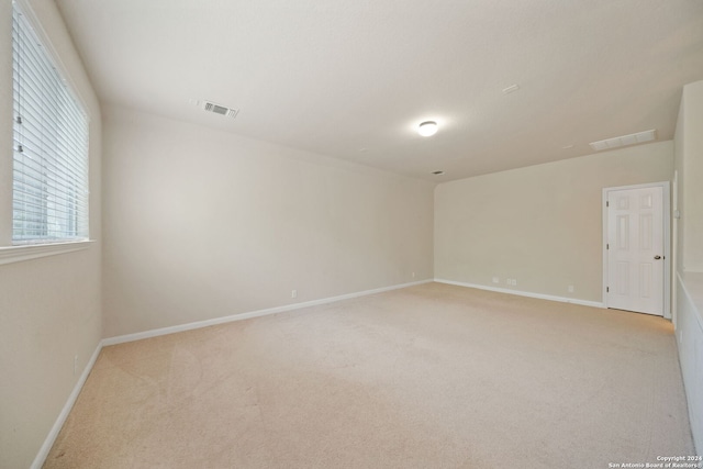 empty room with light carpet