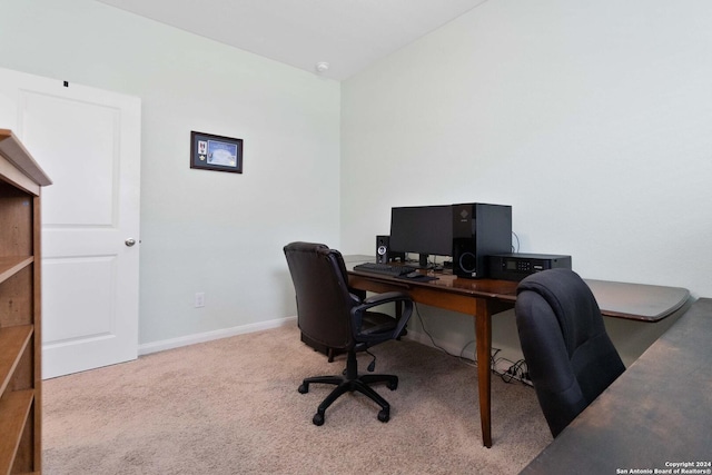 office featuring carpet and baseboards