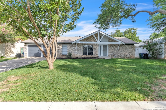 view of front of home featuring a garage and a front yard