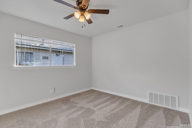 carpeted empty room with ceiling fan