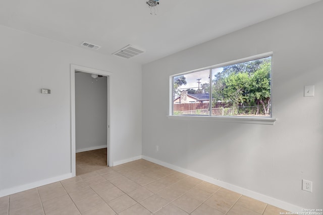 view of tiled empty room