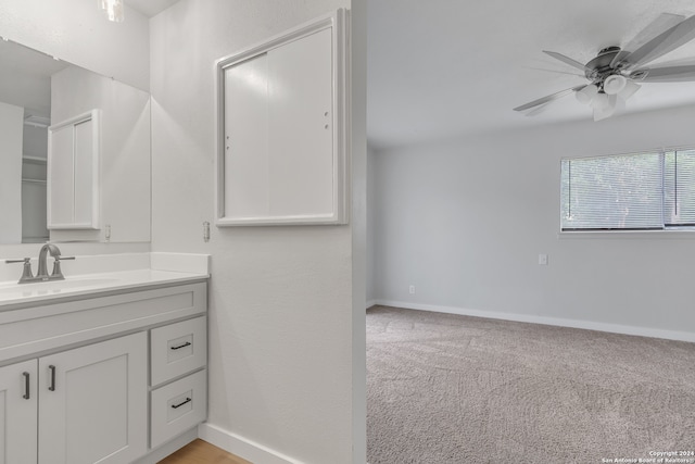 bathroom with vanity and ceiling fan