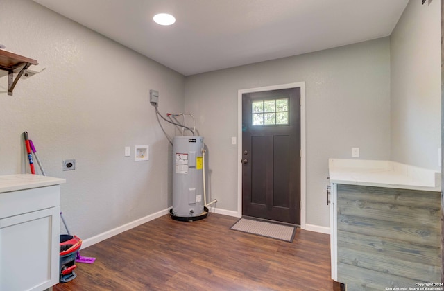 entryway featuring water heater and dark wood-type flooring