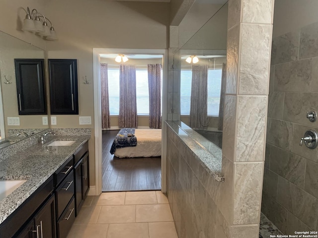 bathroom with tile patterned flooring and vanity