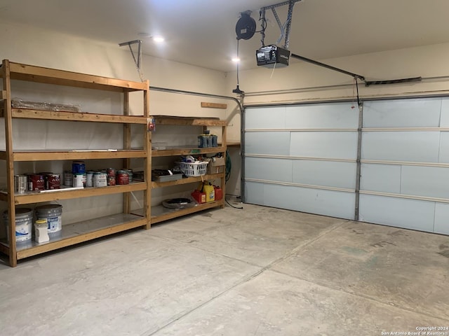 garage featuring a garage door opener