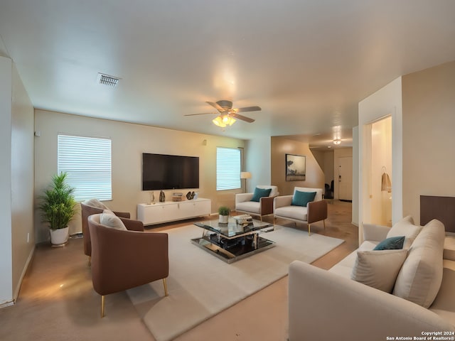 living room featuring ceiling fan