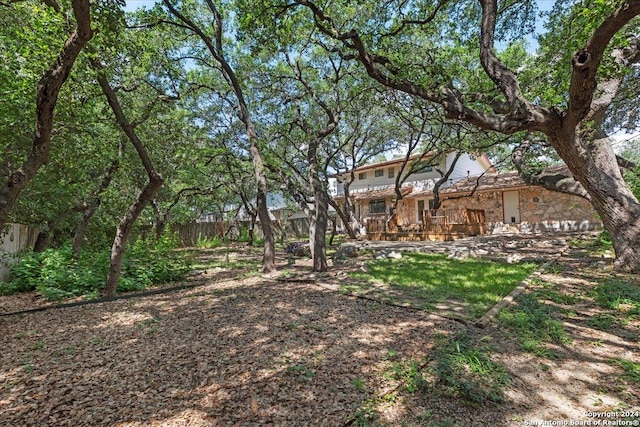 view of yard featuring a deck