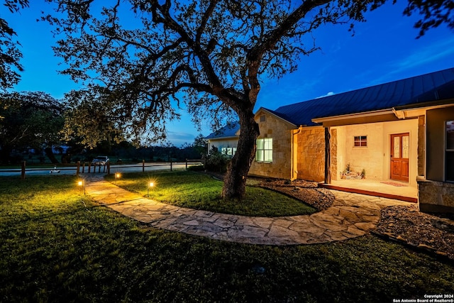 yard at dusk with fence