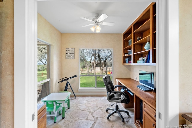 office featuring a wealth of natural light and ceiling fan