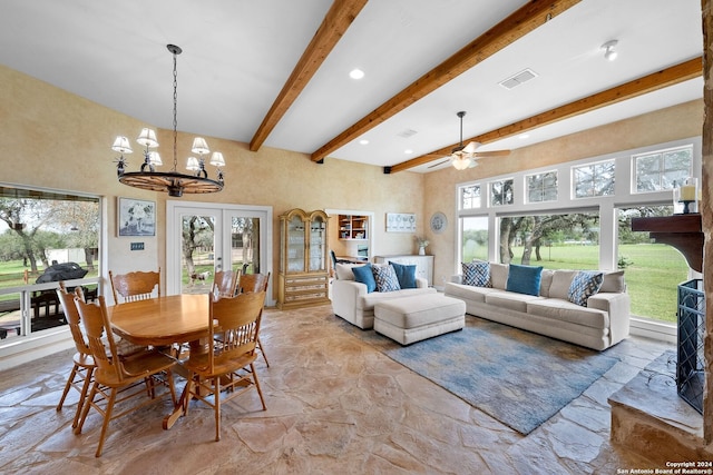 dining area featuring stone tile floors, visible vents, beamed ceiling, and french doors